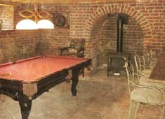 Pool table and fireplace